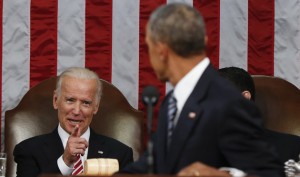 Vice President Joe Biden points at President Barack Obama during the State of the Union address to a joint session of Congress on Capitol Hill in Washington, Tuesday, Jan. 12, 2016. (AP Photo/Evan Vucci, Pool)
