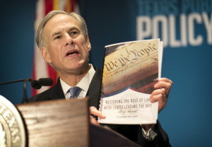 Gov. Greg Abbott calls for a convention of states to amend the Constitution during a speech at the Texas Public Policy Foundation in Austin, Texas, Friday, Jan. 8, 2016. Abbott called on Texas to take the lead in pushing for constitutional amendments that would give states power to ignore federal laws and override decisions by the U.S. Supreme Court. (Jay Janner/Austin American-Statesman via AP) MANDATORY CREDIT