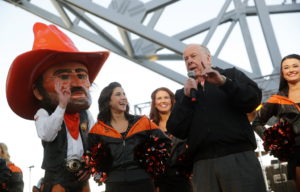 Oklahoma State alum T. Boone Pickens, Jr. fires up the Cowboy fan base during a tailgate party on the East Plaza of AT&T Stadium before the Cotton Bowl game against Missouri, Friday, January 3, 2014 in Arlington, Texas. (Tom Fox/The Dallas Morning News) 01042014xSPORTS